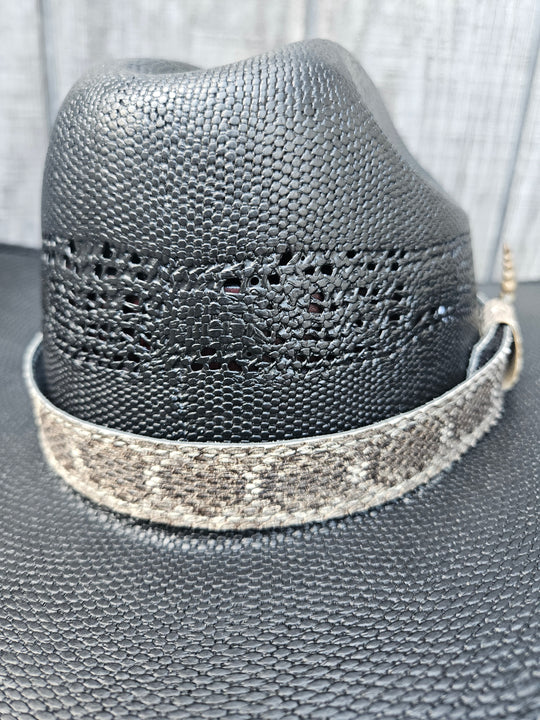 This is a Western Diamondback Snake Skin Hatband. The Western pattern is a little less defined than the Eastern or a Canebrake. The have a Rattler at the of the band that points up slightly and will connect together with a velcro adjustmentand a sliding keeper. Authentic Rattlesnake skin with a pigskin back. Of course you can pick them out if you come to our Smyrna, TN shop not far from Nashville.