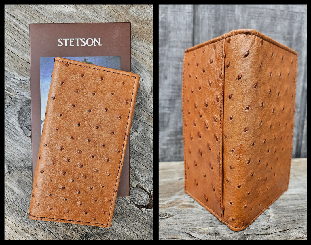 The Stetson Ostrich Long Wallet is made from authentic Ostrich leather in a Antique Cognac color, this Long checkbook wallet blends classic western style with bold luxury. The Stetson name guarantees top-notch craftsmanship and meticulous detail. It offers 12 card slots, 3 hidden pockets underneath, plus an outside cash slot. Available now at our Smyrna, TN store, just a quick 30-minute drive from downtown Nashville. Proudly made in Mexico.

Size 6 5/8" tall x 3 1/2" wide (folded)