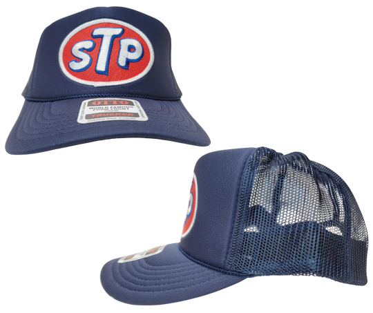This STP hat is part of our new Navy Blue Foam Front Classic Trucker Hat Collection. This Curved Bill mesh back trucker hat features a big Vintage STP Embroidered Patch sewn on the front panel making this is as old school cool as it gets! Snapback one size fits most y’all.&nbsp;Get yours now at our Smyrna, TN store or online!