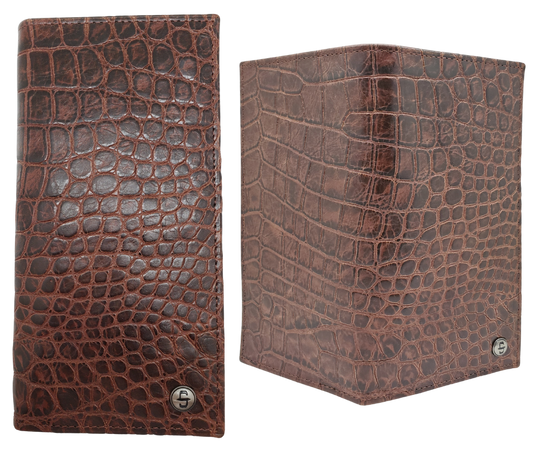 Fully Licensed Stetson Logo Roper/Checkbook style Wallet. Made from Cognac Brown Croc or Black print cowhide leather so good it's really hard to tell the difference from the real thing! Classic Roper design on the inside made from soft durable cowhide leather. Featuring on the left inside 6 card slots and I.D. pocket along 2 underside pockets. On the right inside 1 under pocket with a additional slot on top. In stock at our Smyrna, TN retail store 30 min. from downtown Nashville. Imported.