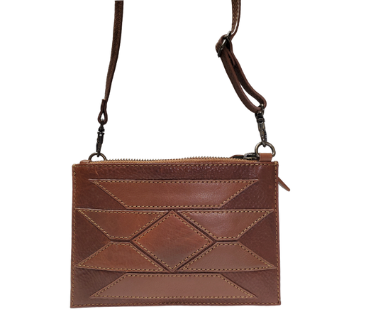 Southwest Crossbody style bag.
2 zippered main pockets
3 card slots in each zippered pocket
7.5x2x5.5&nbsp;
Imported