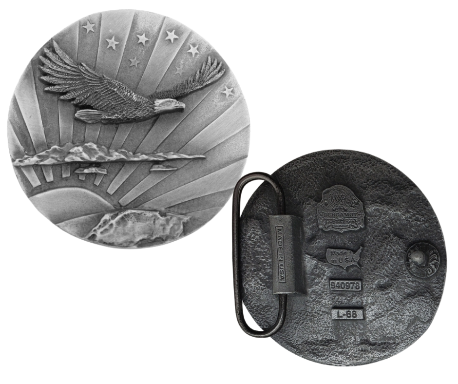 The Eagle is an iconic symbol of America, representing Freedom, Power, and Liberty. With its circular design, this buckle is comfortable to wear and pairs well with any belt. Crafted from top-quality pewter, it is specifically made to fit 1 1/2" belts and measures 2 3/4" in diameter. Find it at our shop in Smyrna, TN, just a short drive from Nashville.