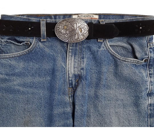 The "Sunshine" buckle features an oval design adorned with charming western-style flowers. It fits a standard 1 1/2" belt and showcases a dark antique and silver finish, with golden highlights at the heart of each flower. Measuring about 2 1/2" by 3 3/4", this buckle brings a sunny touch to your outfit. Grab yours online or visit us in Smyrna, TN, just a stone’s throw from Nashville!