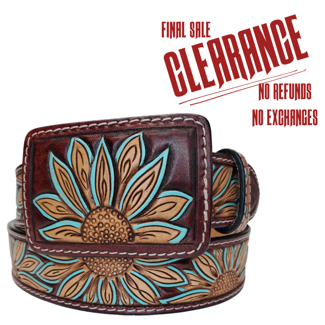 This all veg-tan Leather belt boasts a Sunflower design of natural color set on a dark brown background with a touch of turquoise on the petals and completed with white contrast stitching along the edges. The Matching leather belt buckle can be easily removed and changed thanks to the screw post closure. Whether you choose to shop online or visit our Smyrna, TN store, not far from Famous downtown Nashville. Imported