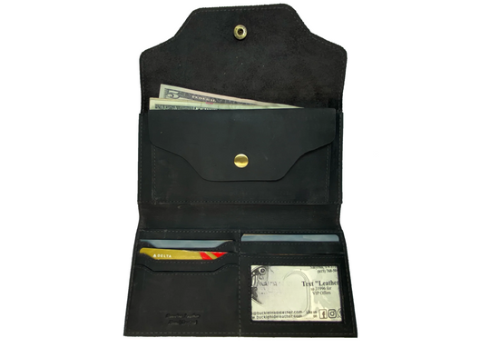 Leather Long Clutch Style Wallet with 4 card slots, I.D. slot, cash and coin pocket, zippered pocket. A convenient way to keep everything you need in one place! Imported and Buckle and Hide Approved! Available in Distressed Brown, Grey, Turquoise.