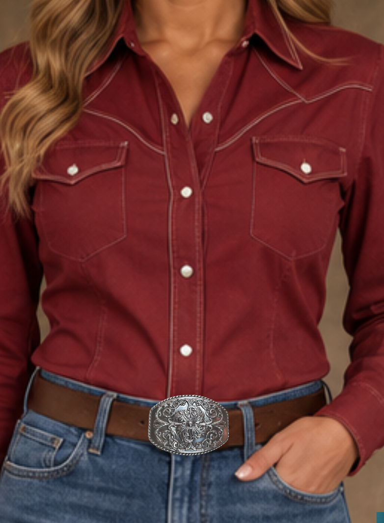 This stylish Antique Silver buckle features an Oval shape with a raised western scroll pattern. It is designed to fit 1 1/2" belts and measures approximately 2.5" x.3", Imported