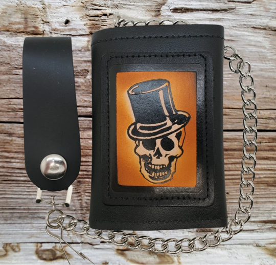 Skull Top Hat all leather Tri-fold Chain Wallet. 1 Cash Slot for all your important stash, 3 card slots and 1 underneath the middle slot. It&
