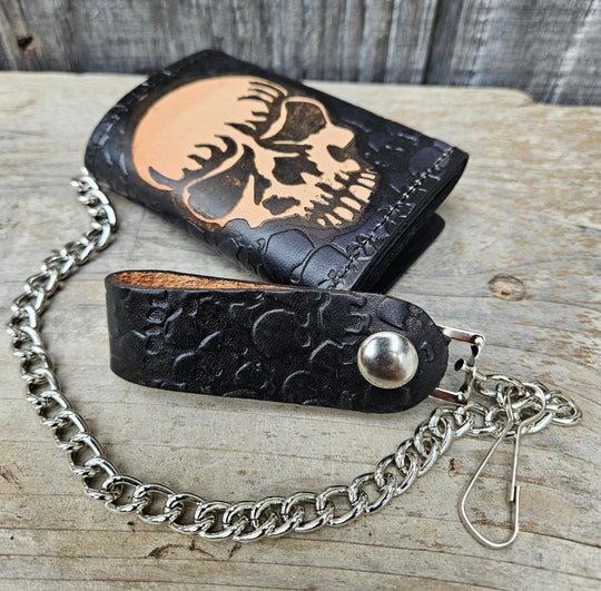 Skulls pattern all leather Tri-fold Chain Wallet. 1 Cash Slot for all your important stash, 3 card slots and 1 underneath the middle slot. It&