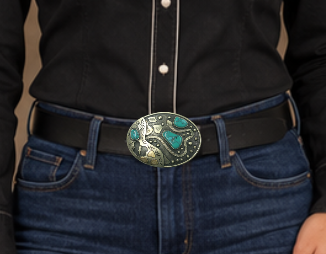 The Snake River buckle is made from German Silver (nickel and brass alloy) or iron metal base. Each piece is punched, cut, soldered, engraved, polished and painted by our talented metal workers.  Our products give you the quality and long for lasting final product. Available at our Smyrna, TN shop just outside of Nashville. Approx. Width 4” Height 3”