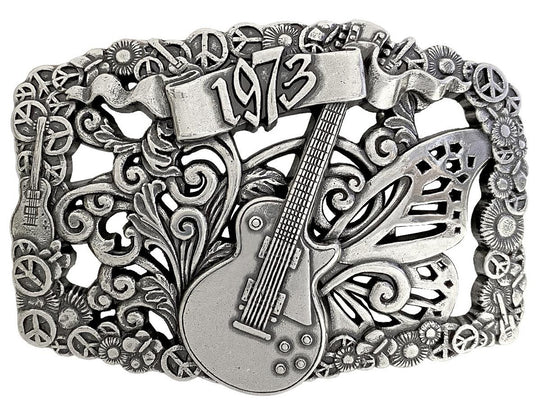 We named this after The 1973 concert featuring The Grateful Dead, Allman Brothers, &amp; The Band: and a HUGE crowd. The buckle has A Filigreed Butterfly, Peace signs, Les Paul guitar, Scroll and Flower designs in Antique Nickel color that looks great on plain 1 1/2" Black or Brown belt. A easy to wear oval shape that&