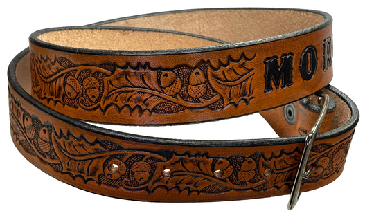 The Tall Oak Name Leather Belt is crafted from strong, high-quality Veg tan leather with an embossed Oak and Acorn pattern. Choose your finish and a name if desired. Its solid Antique nickel brass buckle is easy to change with included snaps, perfect for everyday wear. Handmade outside of Nashville in Smyrna, TN.
