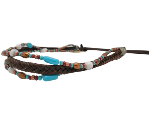 This trendy hatband features a seven strand braid made of genuine horse hair, adorned with coppery metal beads, white and turquoise howlite, and freshwater pearls. It is completed with our signature sunburst conchos, leather tassels, and a horse hair knot for secure fit. Designed to fit most hats, it is available at our Smyrna, Tn shop. Every piece is carefully handcrafted in Montana using horse hair from various sources including Argentina, Mongolia, and Canada.