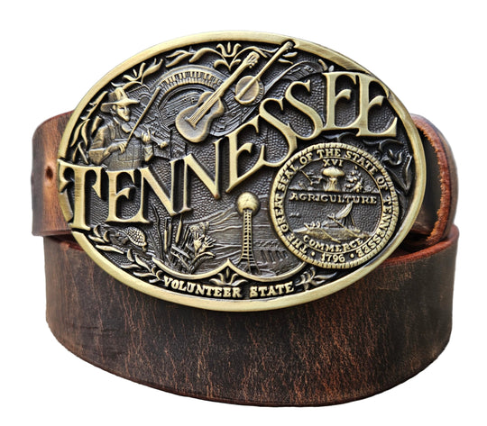 This Tennessee Belt with Montana Silversmith Buckle makes a great Combo. Features a 1 1/2" strap. Choose color: Distressed Brown or Black. The edges are beveled and finished. Available lengths from 34" to 44". The buckle is an Antiqued brass colored Tennessee State Buckle snapped in place. Belt is handmade in our shop in Smyrna, TN, just outside of Nashville