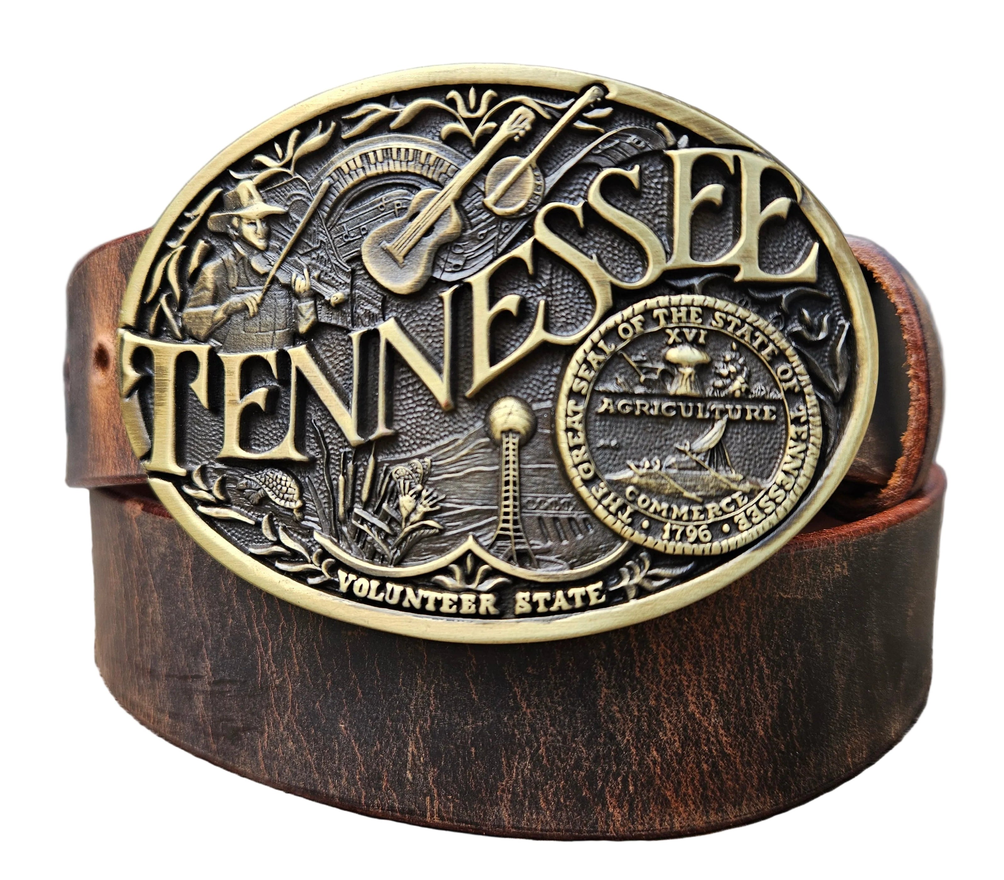 This Tennessee Belt with Montana Silversmith Buckle makes a great Combo. Features a 1 1/2" strap. Choose color: Distressed Brown or Black. The edges are beveled and finished. Available lengths from 34" to 44". The buckle is an Antiqued brass colored Tennessee State Buckle snapped in place. Belt is handmade in our shop in Smyrna, TN, just outside of Nashville