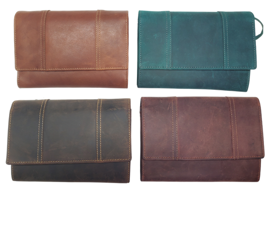 The Tiffany Crossbody Phone wallet is available at our Smyrna, TN shop not far from Nashville. This crossbody phone wallet has 2 accordion pockets, 1 zip pocket,6 additional card slots are placed in front of bag and is covered by flap with a magnetic catch. The inside flap has 5 card pockets and 1 window ID slot. Back of bag has half accordion zip pocket. Crossbody strap is detachable.
Bag size: 7.25” x 5”
4 internal card slots.
Choose from 4 colors