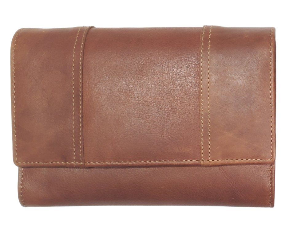 The Tiffany Crossbody Phone wallet is available at our Smyrna, TN shop not far from Nashville. This crossbody phone wallet has 2 accordion pockets, 1 zip pocket,6 additional card slots are placed in front of bag and is covered by flap with a magnetic catch. The inside flap has 5 card pockets and 1 window ID slot. Back of bag has half accordion zip pocket. Crossbody strap is detachable.
Bag size: 7.25” x 5”
4 internal card slots.
Choose from 4 colors