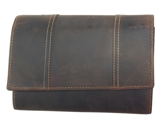 The Tiffany Crossbody Phone wallet is available at our Smyrna, TN shop not far from Nashville. This crossbody phone wallet has 2 accordion pockets, 1 zip pocket,6 additional card slots are placed in front of bag and is covered by flap with a magnetic catch. The inside flap has 5 card pockets and 1 window ID slot. Back of bag has half accordion zip pocket. Crossbody strap is detachable.
Bag size: 7.25” x 5”
4 internal card slots.
Choose from 4 colors