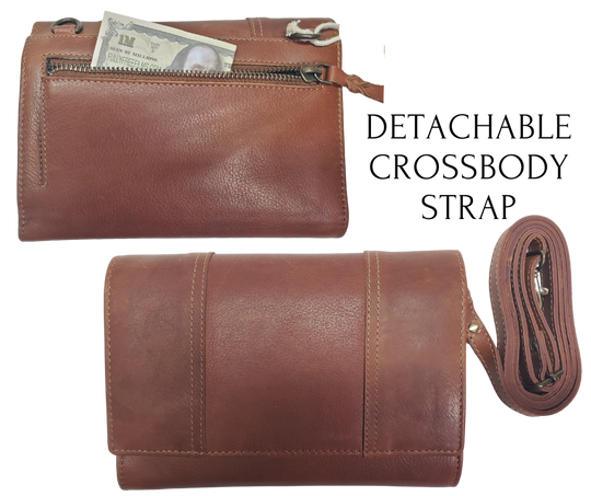 The Tiffany Crossbody Phone wallet is available at our Smyrna, TN shop not far from Nashville. This crossbody phone wallet has 2 accordion pockets, 1 zip pocket,6 additional card slots are placed in front of bag and is covered by flap with a magnetic catch. The inside flap has 5 card pockets and 1 window ID slot. Back of bag has half accordion zip pocket. Crossbody strap is detachable.
Bag size: 7.25” x 5”
4 internal card slots.
Choose from 4 colors