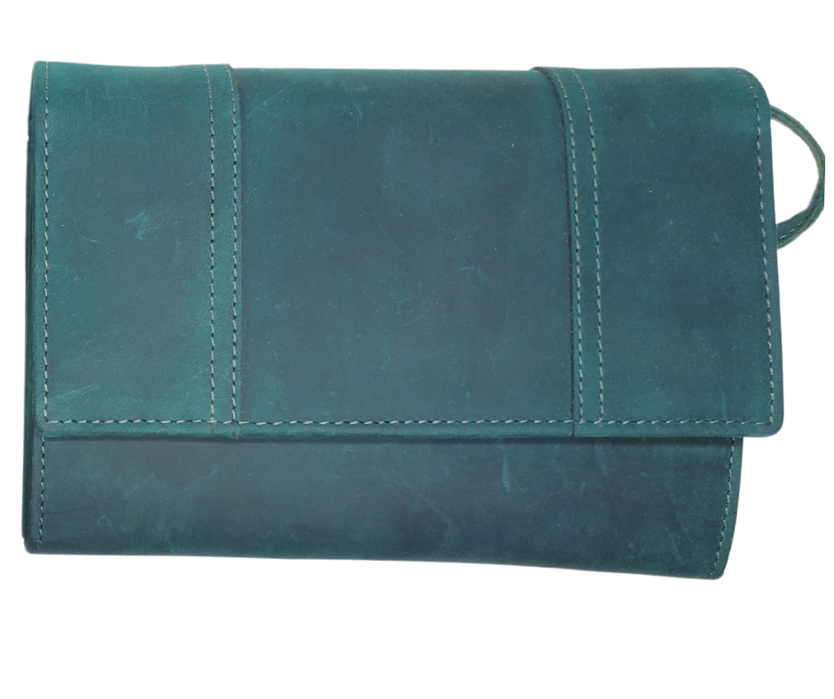 The Tiffany Crossbody Phone wallet is available at our Smyrna, TN shop not far from Nashville. This crossbody phone wallet has 2 accordion pockets, 1 zip pocket,6 additional card slots are placed in front of bag and is covered by flap with a magnetic catch. The inside flap has 5 card pockets and 1 window ID slot. Back of bag has half accordion zip pocket. Crossbody strap is detachable.
Bag size: 7.25” x 5”
4 internal card slots.
Choose from 4 colors