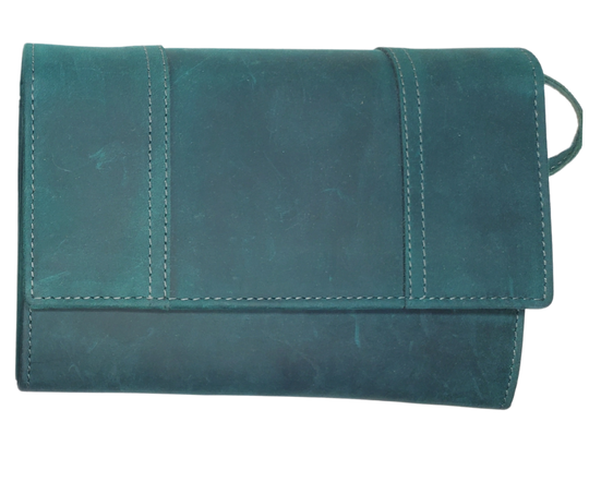The Tiffany Crossbody Phone wallet is available at our Smyrna, TN shop not far from Nashville. This crossbody phone wallet has 2 accordion pockets, 1 zip pocket,6 additional card slots are placed in front of bag and is covered by flap with a magnetic catch. The inside flap has 5 card pockets and 1 window ID slot. Back of bag has half accordion zip pocket. Crossbody strap is detachable.
Bag size: 7.25” x 5”
4 internal card slots.
Choose from 4 colors