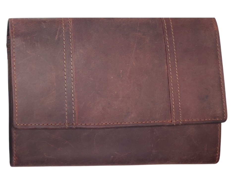 The Tiffany Crossbody Phone wallet is available at our Smyrna, TN shop not far from Nashville. This crossbody phone wallet has 2 accordion pockets, 1 zip pocket,6 additional card slots are placed in front of bag and is covered by flap with a magnetic catch. The inside flap has 5 card pockets and 1 window ID slot. Back of bag has half accordion zip pocket. Crossbody strap is detachable.
Bag size: 7.25” x 5”
4 internal card slots.
Choose from 4 colors