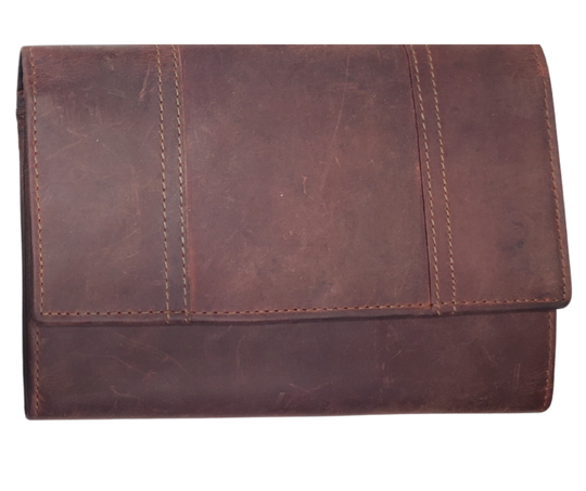 The Tiffany Crossbody Phone wallet is available at our Smyrna, TN shop not far from Nashville. This crossbody phone wallet has 2 accordion pockets, 1 zip pocket,6 additional card slots are placed in front of bag and is covered by flap with a magnetic catch. The inside flap has 5 card pockets and 1 window ID slot. Back of bag has half accordion zip pocket. Crossbody strap is detachable.
Bag size: 7.25” x 5”
4 internal card slots.
Choose from 4 colors