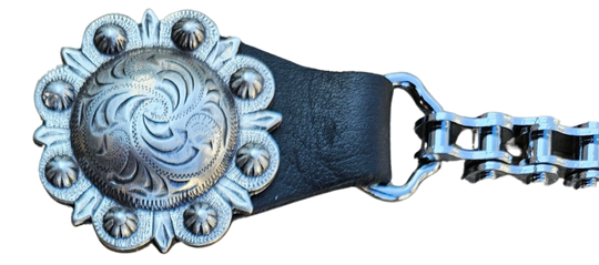 BUY 2 or more and SAVE! We call these our TITAN vest chains because of the large size conchos that are approximately DOUBLE sized! The screwed on conchos attach to a leather connector with snaps that fit most all vest. The Bike Style Chain also makes these unique to the typical traditional vest chains we offer. Ride on over to our Smyrna, TN store not far from Boswell&