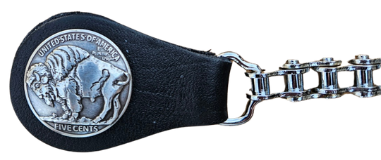 BUY 2 or more and SAVE! We call these our TITAN vest chains because of the large size conchos that are approximately DOUBLE sized! The screwed on conchos attach to a leather connector with snaps that fit most all vest. The Bike Style Chain also makes these unique to the typical traditional vest chains we offer. Ride on over to our Smyrna, TN store not far from Boswell&