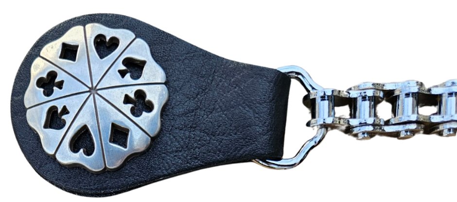 BUY 2 or more and SAVE! We call these our TITAN vest chains because of the large size conchos that are approximately DOUBLE sized! The screwed on conchos attach to a leather connector with snaps that fit most all vest. The Bike Style Chain also makes these unique to the typical traditional vest chains we offer. Ride on over to our Smyrna, TN store not far from Boswell&