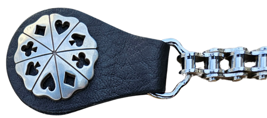 BUY 2 or more and SAVE! We call these our TITAN vest chains because of the large size conchos that are approximately DOUBLE sized! The screwed on conchos attach to a leather connector with snaps that fit most all vest. The Bike Style Chain also makes these unique to the typical traditional vest chains we offer. Ride on over to our Smyrna, TN store not far from Boswell&