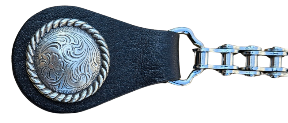 BUY 2 or more and SAVE! We call these our TITAN vest chains because of the large size conchos that are approximately DOUBLE sized! The screwed on conchos attach to a leather connector with snaps that fit most all vest. The Bike Style Chain also makes these unique to the typical traditional vest chains we offer. Ride on over to our Smyrna, TN store not far from Boswell&