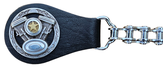 BUY 2 or more and SAVE! We call these our TITAN vest chains because of the large size conchos that are approximately DOUBLE sized! The screwed on conchos attach to a leather connector with snaps that fit most all vest. The Bike Style Chain also makes these unique to the typical traditional vest chains we offer. Ride on over to our Smyrna, TN store not far from Boswell&