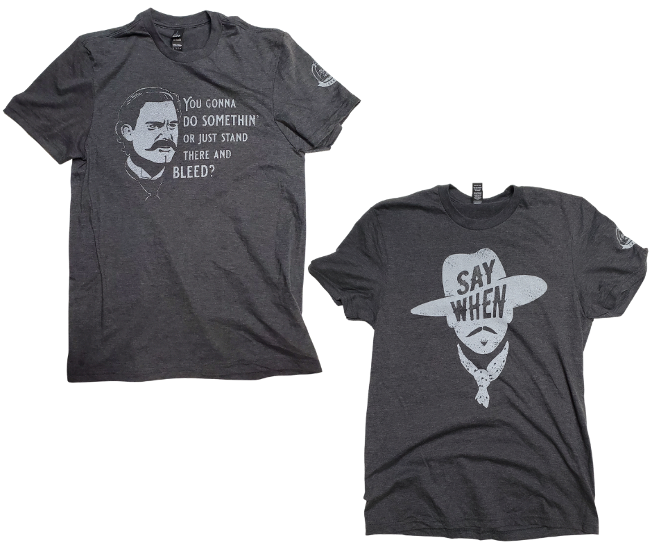  If you like Tombstone, Doc Holliday, Wyatt Earp you will want this. You know all the great one liners from Doc. Turn on your favorite Wayne or Eastwood movie and your good to go!  Available online and in our retail shop in Smyrna, TN.  Image on the front chest area, brand logo on left sleeve  Made of super soft 100% cotton 