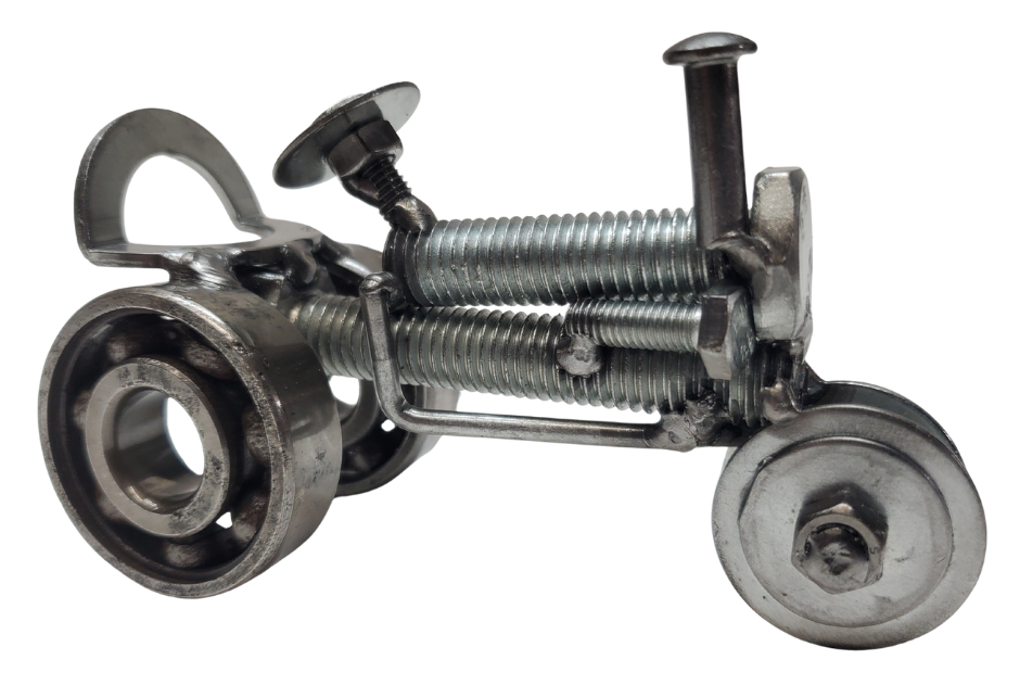 The perfect addition to your Man Cave! This metal art piece is a unique gift for any Tractor enthusiast. Featuring nuts, bolts, springs, and bearing wheels, even a spark plug. It even stands on it's own. Need more details? Take a look at the picture for dimensions. You can find it at our store in Smyrna, conveniently located just outside Nashville, TN.

Size is Approx. 5" long x 3" tall x 2" wide
Imported