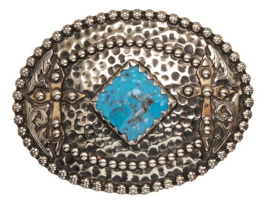Tubal-Cain was the original master behind crafting all your favorite bronze and iron tools. This buckle features a hammered backdrop dotted with rosettes, framed by a beaded metal edge, and sports a diamond-shaped turquoise centerpiece. Each end is decorated with a western scroll and a cross. Measuring about 3"x4", it suits belts up to 1 3/4" wide. Swing by our Smyrna, TN shop to grab yours!