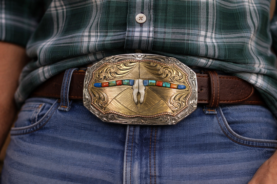 The Tumbleweed Belt Buckle has the ever classic Longhorn design accented with a multi colored stones. A Classic Western belt buckle at it&