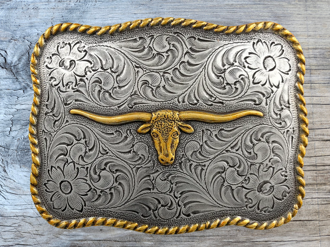 Bring iconic Western Texas Longhorn to your outfit with this classic belt buckle. Works with any leather snap-on belt from this site, or make your own for a custom look. Measurement: 3 1/8" x 2 3/8"; Fits 1 1/2" belts. Featuring a finish with antique-plated zinc with brass accented finish! Pick yours up at our Smyrna, TN shop a short Bull ride from downtown Nashville!