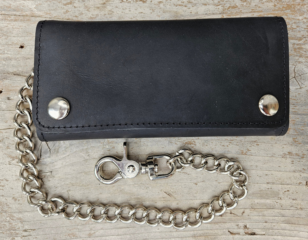 The Cruiser" 13 Pocket Chain Wallet has cards for almost everything. It has 3 folding sections to hold cards, money, receipts, and more!

Simple Black Tri-Fold Biker Wallet
13 Card Slots
1 Clear ID slot
Inside pocket with zipper
Secure Snap Closure
7.00” x 3.75"