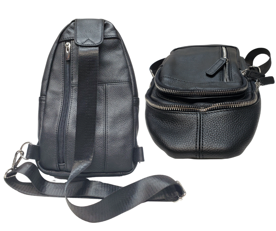 The Daily Carry Sling bag has two spacious main compartments. One main compartment has Interior throw pocket and 1 zipper pocket 1 exterior vertical zipper pocket on front side for your accessories. Backside has 1 vertical zipper pocket Metal loops are to adjust which side the strap attaches Adjustable shoulder strap, Leather pulls

Material: Cowhide leather Colors: black, cream, light brown
Size: 11 ¼”x 6½”x 3”