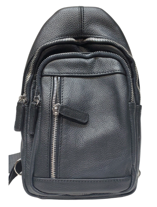 The Daily Carry Sling bag has two spacious main compartments. One main compartment has Interior throw pocket and 1 zipper pocket 1 exterior vertical zipper pocket on front side for your accessories. Backside has 1 vertical zipper pocket Metal loops are to adjust which side the strap attaches Adjustable shoulder strap, Leather pulls

Material: Cowhide leather Colors: black, cream, light brown
Size: 11 ¼”x 6½”x 3”