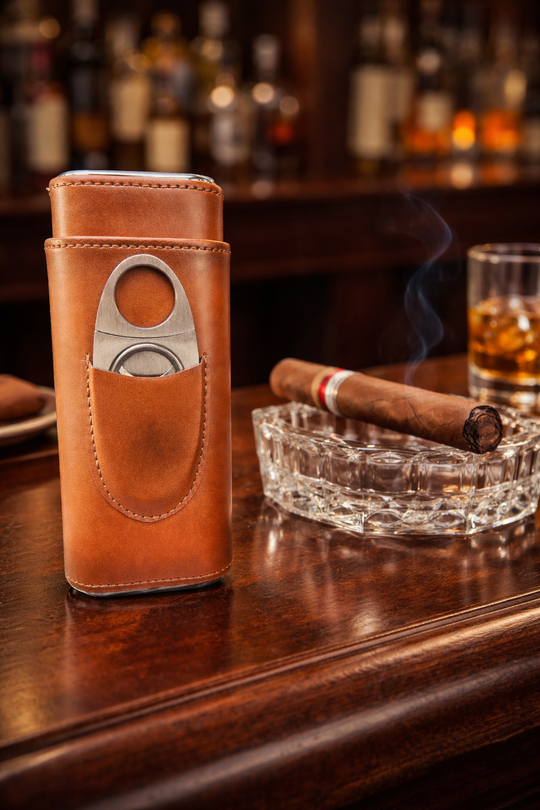 The Humidor Leather Cigar Case, with Cedar Wood Lining Cigar Humidor. Includes a Silver Stainless Steel Cutter Holding max length 6.5 inches and up to ring gauge 52 in. Perfect Gift For Husband ,Boy friend, Groomsmen, Boss, Father, Any Cigar Lovers Very suitable for gifts to friends, dads, grandpa and cigar smokers. Now stocked at our Smyrna, TN shop close to Murfreesboro.

Dimensions: 7 x 3.6 x 1.4
Easy carry for traveling