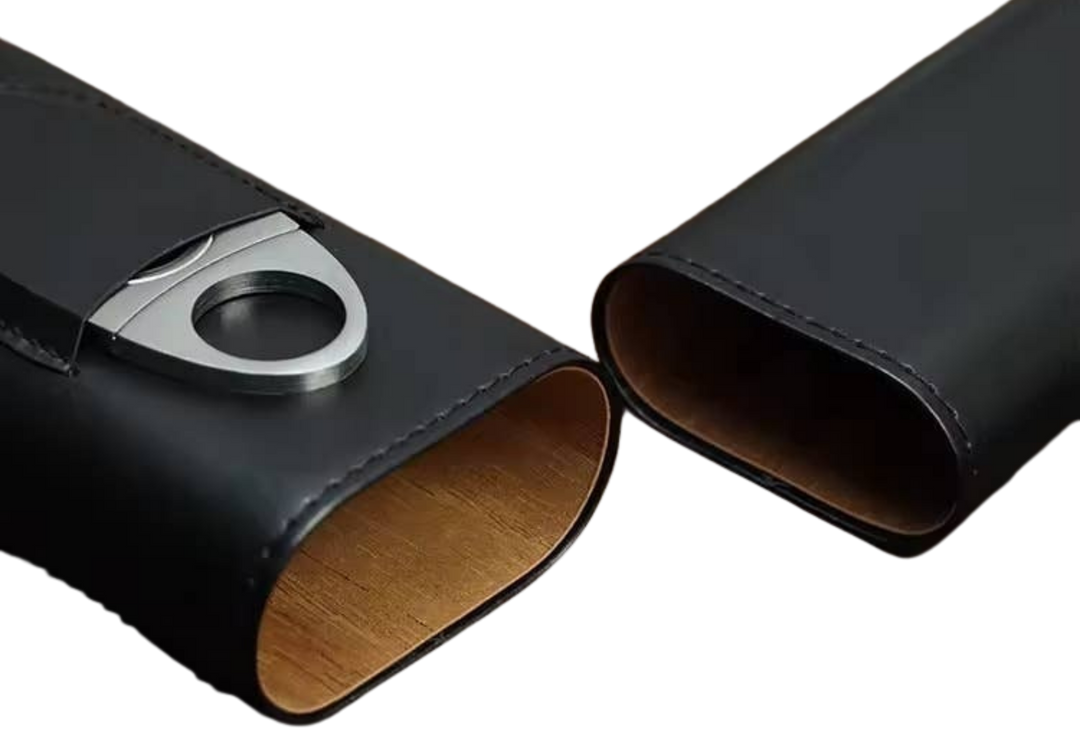 The Humidor Leather Cigar Case, with Cedar Wood Lining Cigar Humidor. Includes a Silver Stainless Steel Cutter Holding max length 6.5 inches and up to ring gauge 52 in. Perfect Gift For Husband ,Boy friend, Groomsmen, Boss, Father, Any Cigar Lovers Very suitable for gifts to friends, dads, grandpa and cigar smokers. Now stocked at our Smyrna, TN shop close to Murfreesboro.

Dimensions: 7 x 3.6 x 1.4
Easy carry for traveling