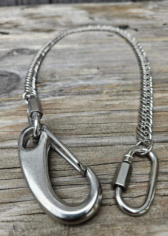 The Long Haul Wallet Chain attaches to your wallet to your jeans with a strong Stainless Steel chain. This chain is approx. 3/8" flat Cuban style link and and about 26" in length with sturdy claw and ends oval ends that loosen for easy attachment.