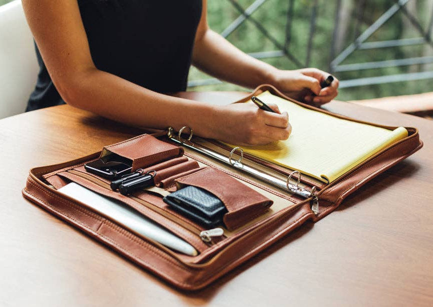 The Metropolitan 3 Ring Binder Padfolio will give you the confidence needed for your important meeting. Constructed with Naked leather, very soft with a natural feel. This Leather improves with age as it absorbs the oils from your hands and assumes a classic, worn look over time. Part of our new Home and Office category. Stop by our Smyrna, TN store and see for yourself.