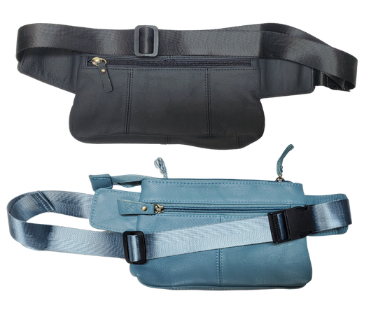 The on the Go Cowhide leather waist pack. Fully adjustable nylon waist belt with snap buckle closure. Two spacious main compartments, one with an interior zipper pocket. Back side has a discrete zipper pocket. Color match zipper and gold brushed hardware with leather pulls. Get yours at our local Smyrna, TN shop.

Cowhide genuine leather
Size: 8 ½” x 5” x ¾”
Front zipper pocket: 7” x 4 ½”
Waist length: adjust to 50 “
Color: Black, cream, light blue