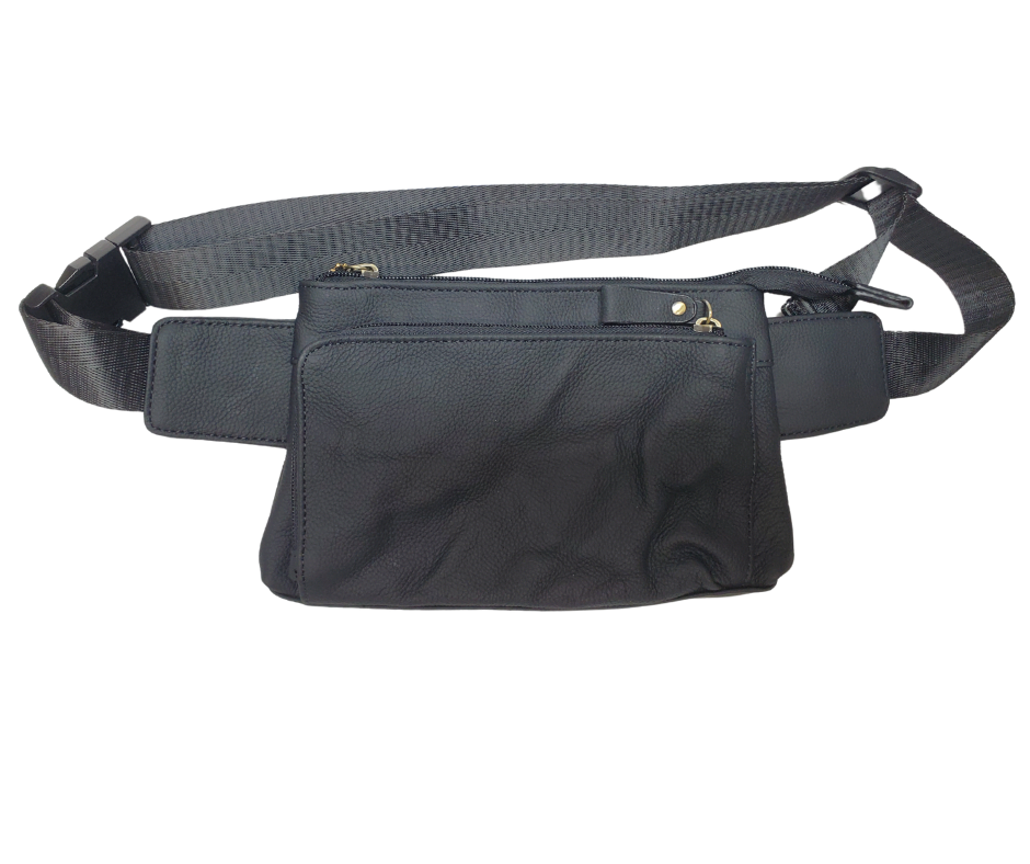 The On the Go Cowhide leather waist pack. Fully adjustable nylon waist belt with snap buckle closure. Two spacious main compartments, one with an interior zipper pocket. Back side has a discrete zipper pocket. Color match zipper and gold brushed hardware with leather pulls. Get yours at our local Smyrna, TN shop.

Cowhide genuine leather
Size: 8 ½” x 5” x ¾”
Front zipper pocket: 7” x 4 ½”
Waist length: adjust to 50 “
Color: Black, cream, light blue