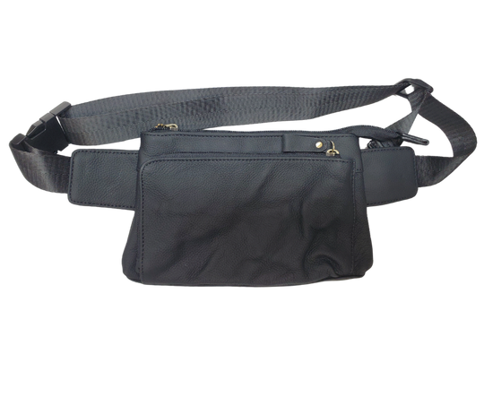 The On the Go Cowhide leather waist pack. Fully adjustable nylon waist belt with snap buckle closure. Two spacious main compartments, one with an interior zipper pocket. Back side has a discrete zipper pocket. Color match zipper and gold brushed hardware with leather pulls. Get yours at our local Smyrna, TN shop.

Cowhide genuine leather
Size: 8 ½” x 5” x ¾”
Front zipper pocket: 7” x 4 ½”
Waist length: adjust to 50 “
Color: Black, cream, light blue