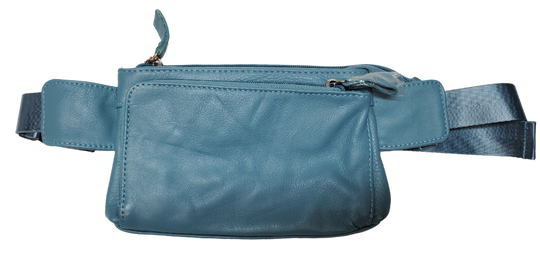 The on the Go Cowhide leather waist pack. Fully adjustable nylon waist belt with snap buckle closure. Two spacious main compartments, one with an interior zipper pocket. Back side has a discrete zipper pocket. Color match zipper and gold brushed hardware with leather pulls. Get yours at our local Smyrna, TN shop.

Cowhide genuine leather
Size: 8 ½” x 5” x ¾”
Front zipper pocket: 7” x 4 ½”
Waist length: adjust to 50 “
Color: Black, cream, light blue