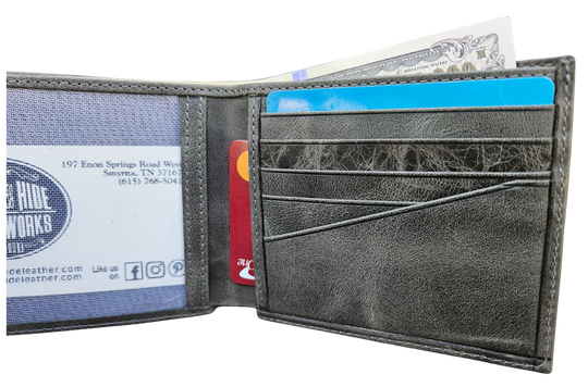 The Standard is a Premium Crazy Horse Leather Bifold Wallet. Known for its distinctive pull-up effect develops a rich patina over time — meaning every scratch, bend, and movement enhances its unique, rugged appearance. Built for everyday use, this wallet offers a slim yet highly functional layout without unnecessary bulk. Now in our Smyrna, TN shop not far rom the Gulch are of Nashville.