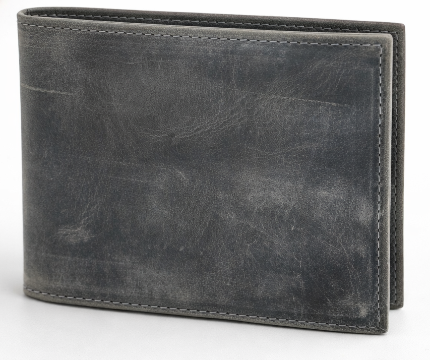 The Standard is a Premium Crazy Horse Leather Bifold Wallet. Known for its distinctive pull-up effect develops a rich patina over time — meaning every scratch, bend, and movement enhances its unique, rugged appearance. Built for everyday use, this wallet offers a slim yet highly functional layout without unnecessary bulk. Now in our Smyrna, TN shop not far rom the Gulch are of Nashville.